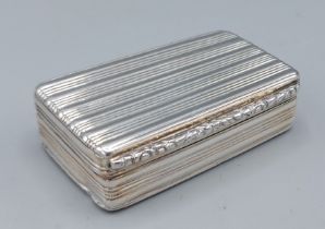 A George IV silver snuff box of ribbed form, with silver gilt interior, Birmingham 1830, maker