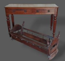 A Victorian mahogany side table together with a 19th Century cradle
