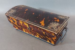 A 19th Century Tortoiseshell casket of shaped form, with a metal beaded cover, side handles and
