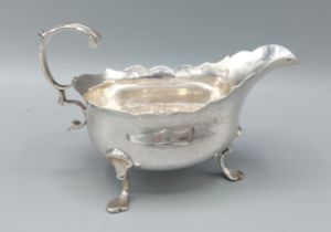 A George III silver sauce jug, London 1771, 3ozs