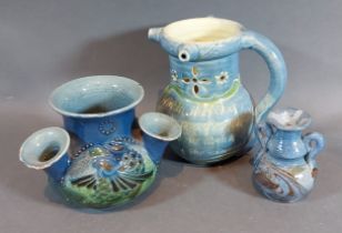 A Barum pottery jug, 13cms tall, together with two Barum pottery vases