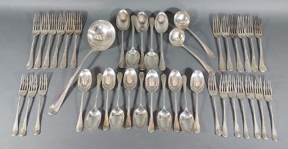 An Edwardian silver canteen of flatware comprising twenty two forks, sixteen spoons and three