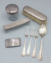 A set of three 800 mark forks together with a matching spoon, a Birmingham silver card case and