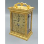 A brass cased Carriage clock, the dial inscribed Viner and Co. London, with subsidiary day, date,