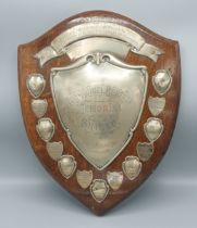A London silver mounted trophy shield, inscribed The Muriel Henry Memorial Shield, 40cms x 31cms