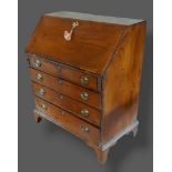 A George III elm bureau, the fall front above four long graduated drawers with oval brass handles