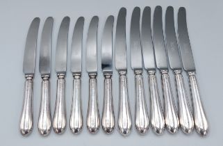 A set of twelve silver handled knives