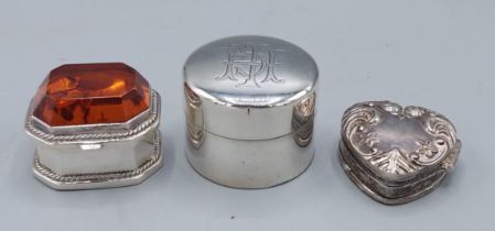 A 925 silver pill box, the hinged cover inset with Amber together with a London silver box of