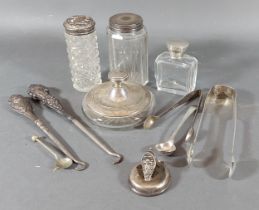 A London silver and glass compact together with a pair of silver sugar tongs and other items