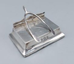 An Edwardian silver paper clip in the form of a wishbone, Birmingham 1903