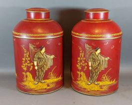 A pair of Toleware cannisters, each with gilded decoration depicting figures upon a red ground,