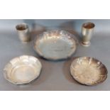 An 800 mark silver bowl together with two 800 mark beakers, and two 835 silver bowls, 22ozs
