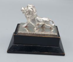 Leo Of M.G.M pictures, model of a lion on an ebonised plinth, inscribed Kine-weekly, National