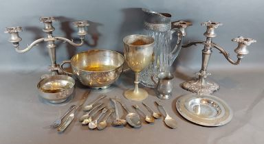 A collection of silver plated items to include a pair of candleabra