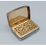 A William IV silver Vinaigrette, the hinged top enclosing a silver gilt interior with pierced grill,