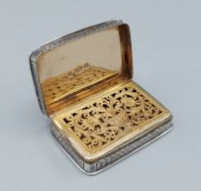 A William IV silver Vinaigrette, the hinged top enclosing a silver gilt interior with pierced grill,