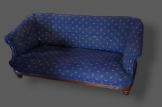 A Victorian small settee with blue upholstery raised upon low turned feet, 150cms long