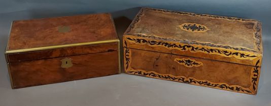 A 19th Century burr walnut foldover writing box, the hinged cover enclosing a fitted interior