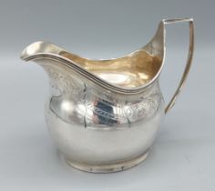George III silver cream jug with engraved decoration, London 1806, 3.5ozs