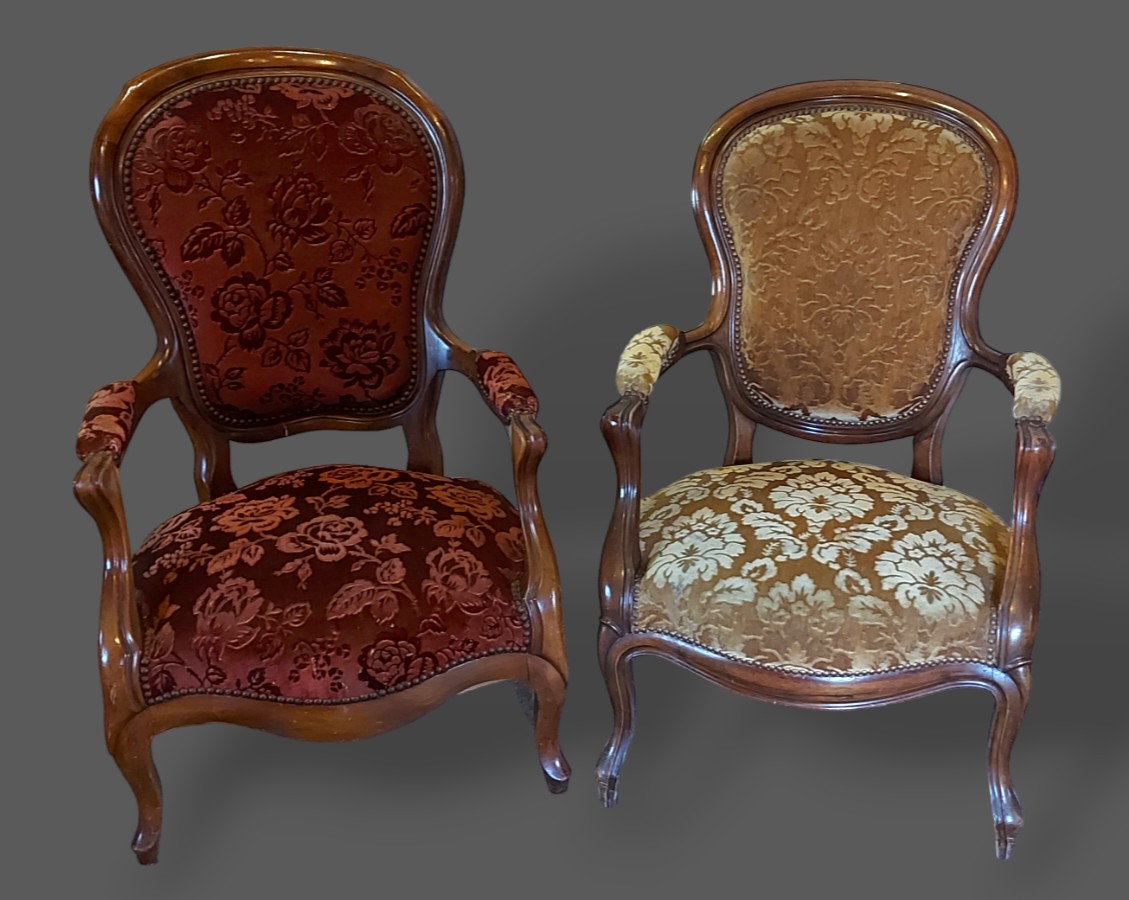 A French mahogany drawing room armchair together with another similar armchair