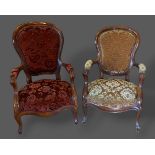 A French mahogany drawing room armchair together with another similar armchair