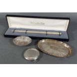 A Franklin Mint 925 silver paper knife together with a London silver pin tray, a Birmingham silver