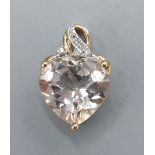 A 9ct yellow gold diamond and quartz set pendant in the for of a heart, 2.5gms