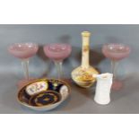 A Royal Worcester blush ivory bottle neck vase, 18cms tall together with a set of three cut glass