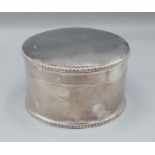 An Edwardian silver box of cylindrical form, Sheffield 1908, maker Atkins Brothers, 13ozs, 12cms
