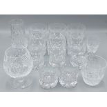 A set of six glass whiskey tumblers by Tudor together with five matching smaller glasses and four