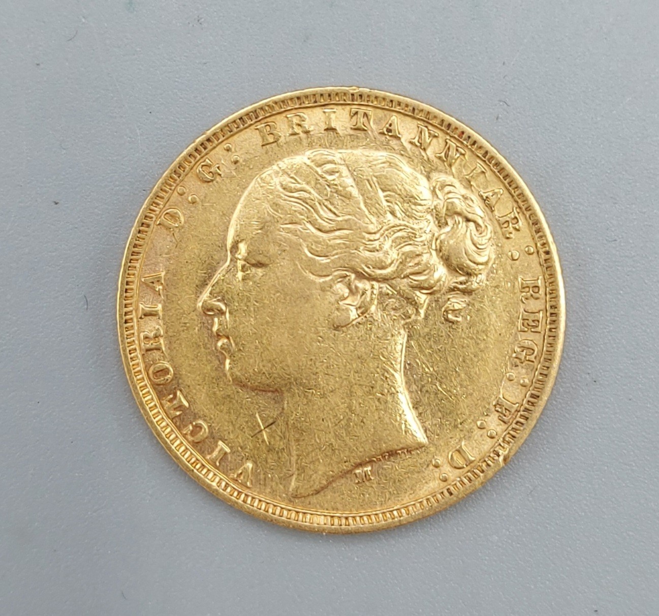 A Victorian full gold Sovereign dated 1873 - Image 2 of 2