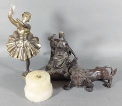 A patinated bronze model of Britannia together with an Art Deco figure and a model of a lion