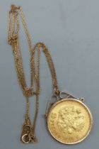A Russian 10 roubles gold coin dated 1899, with 9ct gold mount and neck chain, 11gms