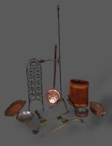 An iron adjustable candle lamp together with other metal wares to include a wine rack