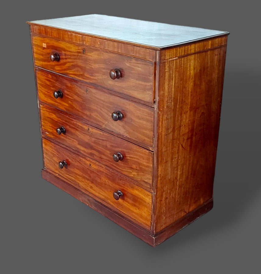 A William IV mahogany secretaire chest, with a fitted secretaire drawer above three further