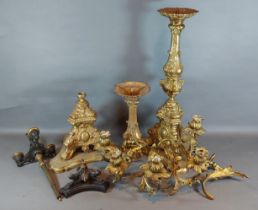 Various parts of a pair of gilt metal candleabrum together with a similar three branch candlabrum