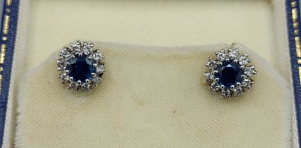 A pair of 9ct white gold Diamond and Sapphire cluster ear studs within original box, 3.8gms
