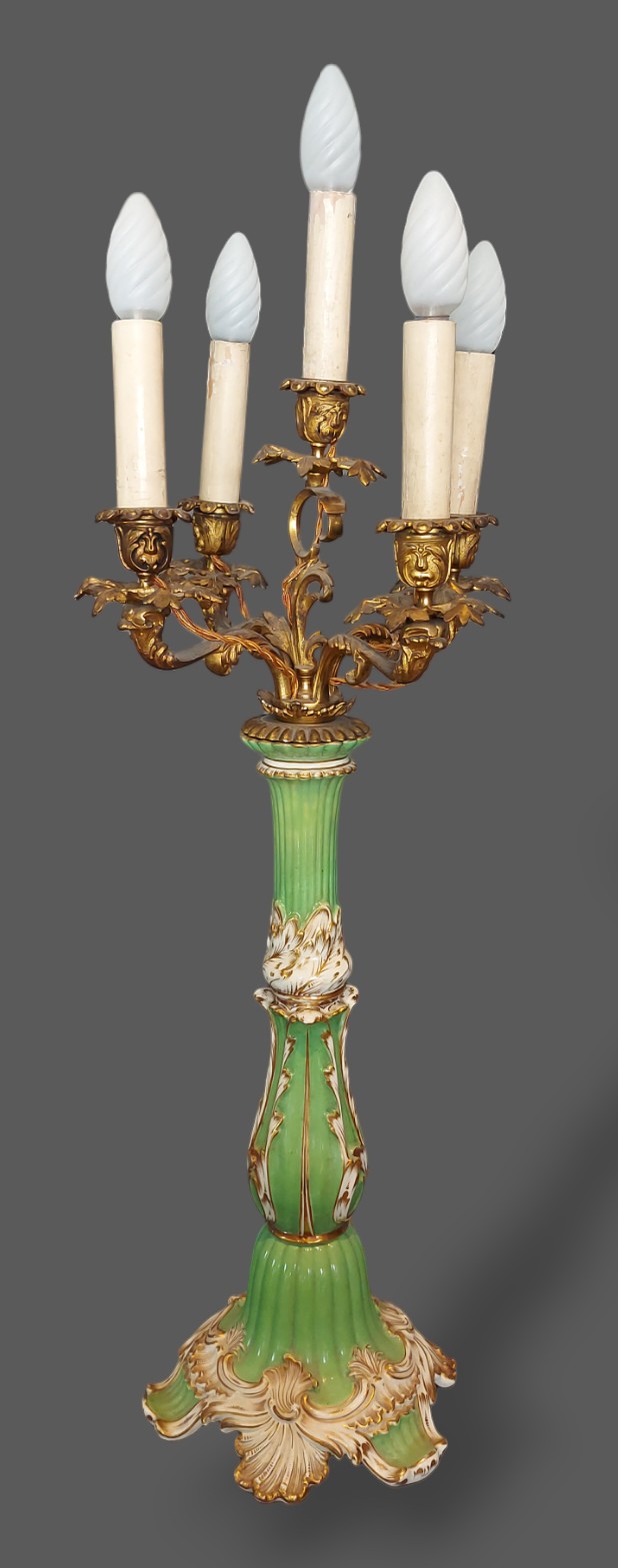 A 19th Century French Ormolu and porcelain five branch candelabrum of scroll form, the green and