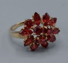 A 9ct gold Garnet set cluster ring, 3.7gms, ring size U