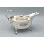 A George III silver sauce jug, London 1771, 3ozs