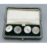 A pair of 18ct gold, enamel, M.O.P. and Diamond set cufflinks