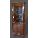 A mahogany standing corner cabinet, 76cms wide by 188cms high, together with an Edwardian side