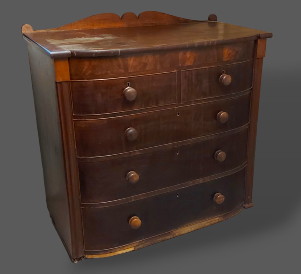 A Victorian mahogany semi bow fronted chest of two and three long drawers, 111cms wide, 56cms deep