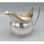 George III silver cream jug with engraved decoration, London 1806, 3.5ozs