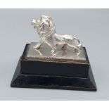 Leo Of M.G.M pictures, model of a lion on an ebonised plinth, inscribed Kine-weekly, National