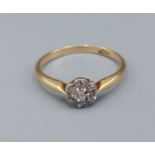 An 18ct gold Diamond cluster ring set with six Diamonds, 2.2gms, ring size P