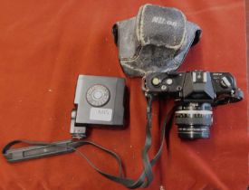 Nikon Camera - Nikkormat FTN AD, with flash unit, with case worn, heavy item with lens, fair to good