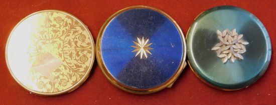 Stratton Powder Compact- Blue enamel lid with gilt star, another green lid with floral silvered