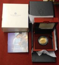 Gold 2022 United Kingdom Queen's Reign Charity and Patronage quarter ounce coin with Royal Mint case