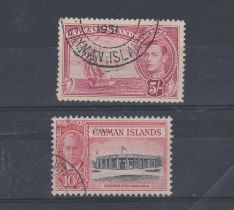 Cayman Islands 1938-1950 George VI SG 125 fine used 5s, SG 147 fine used 10s. Cat value £41